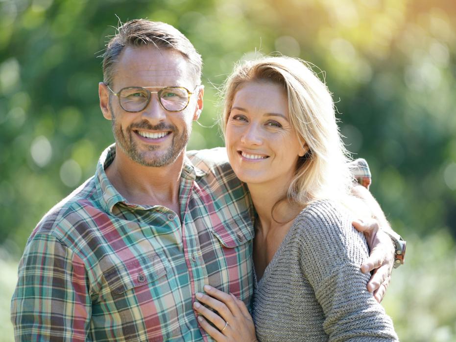 happy couple smiling with bright smiles in highgate hill qld