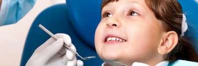 Child smiling during dental check-up with dentist in Highgate Hill QLD