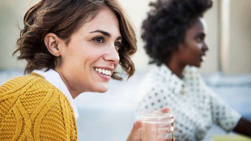 a woman with a bright white smile in brisbane
